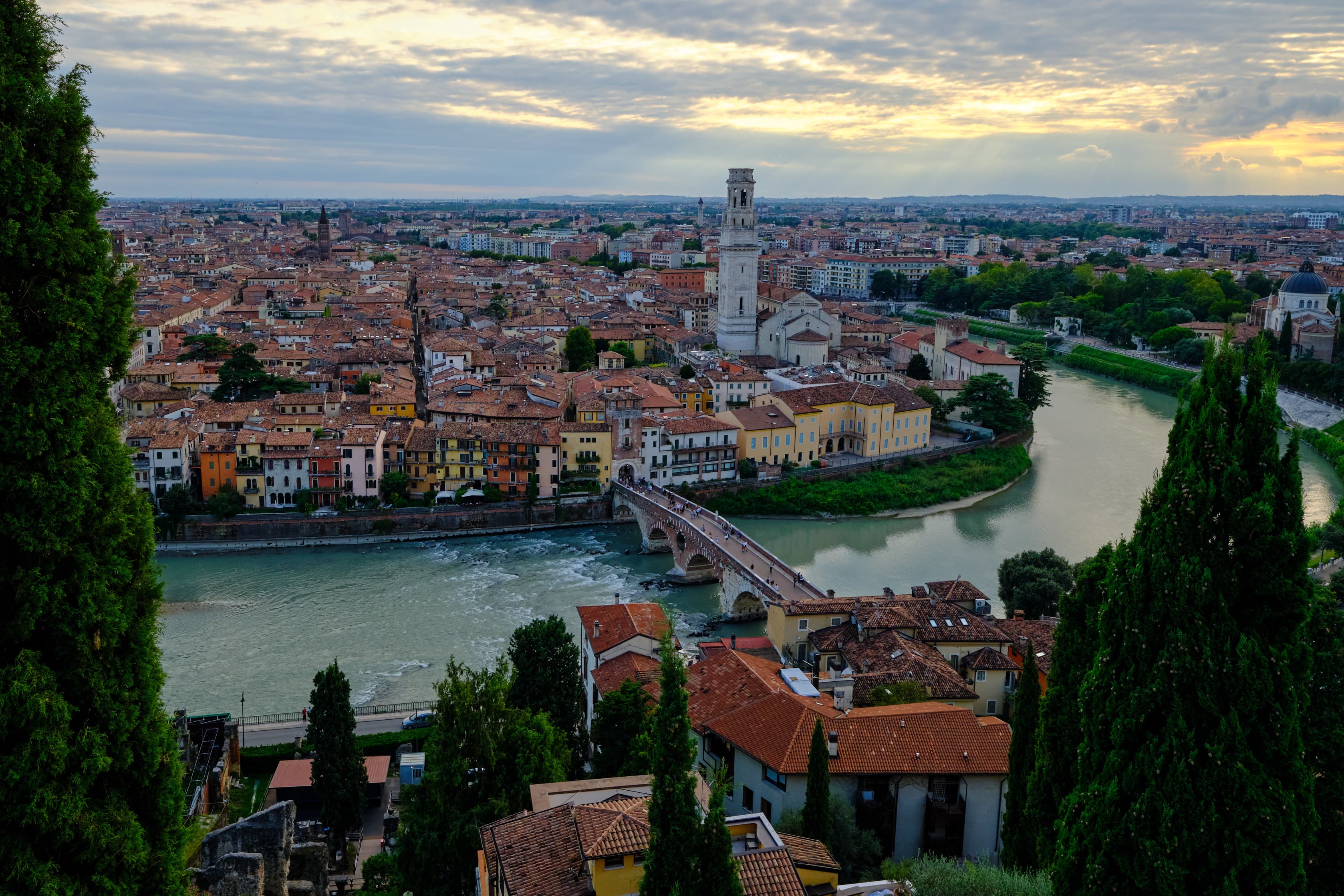 Verona panorama at stormy golden hour, Adige river