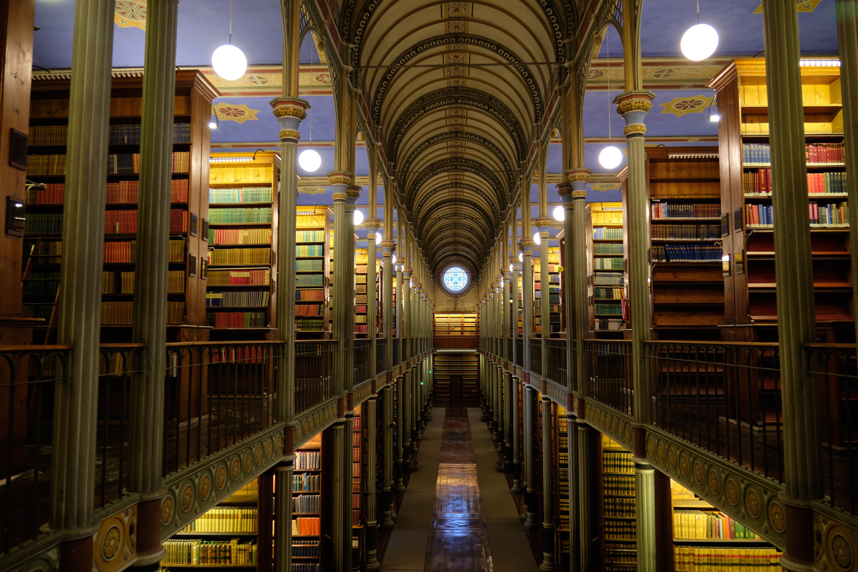 Grand illuminated library hall, amber vaulted ceiling