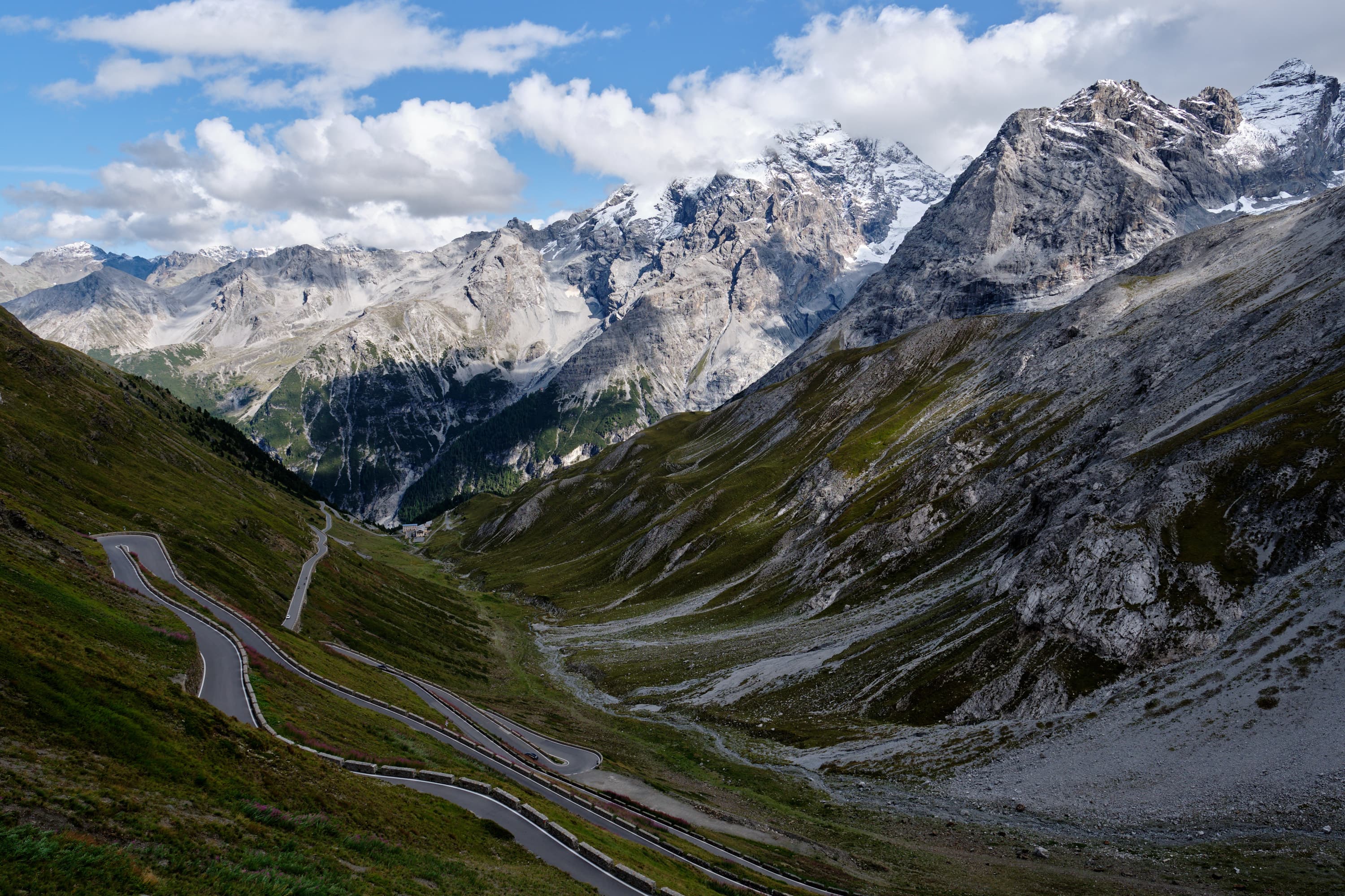Multiple Stelvio Pass hairpin bends descending to valley floor