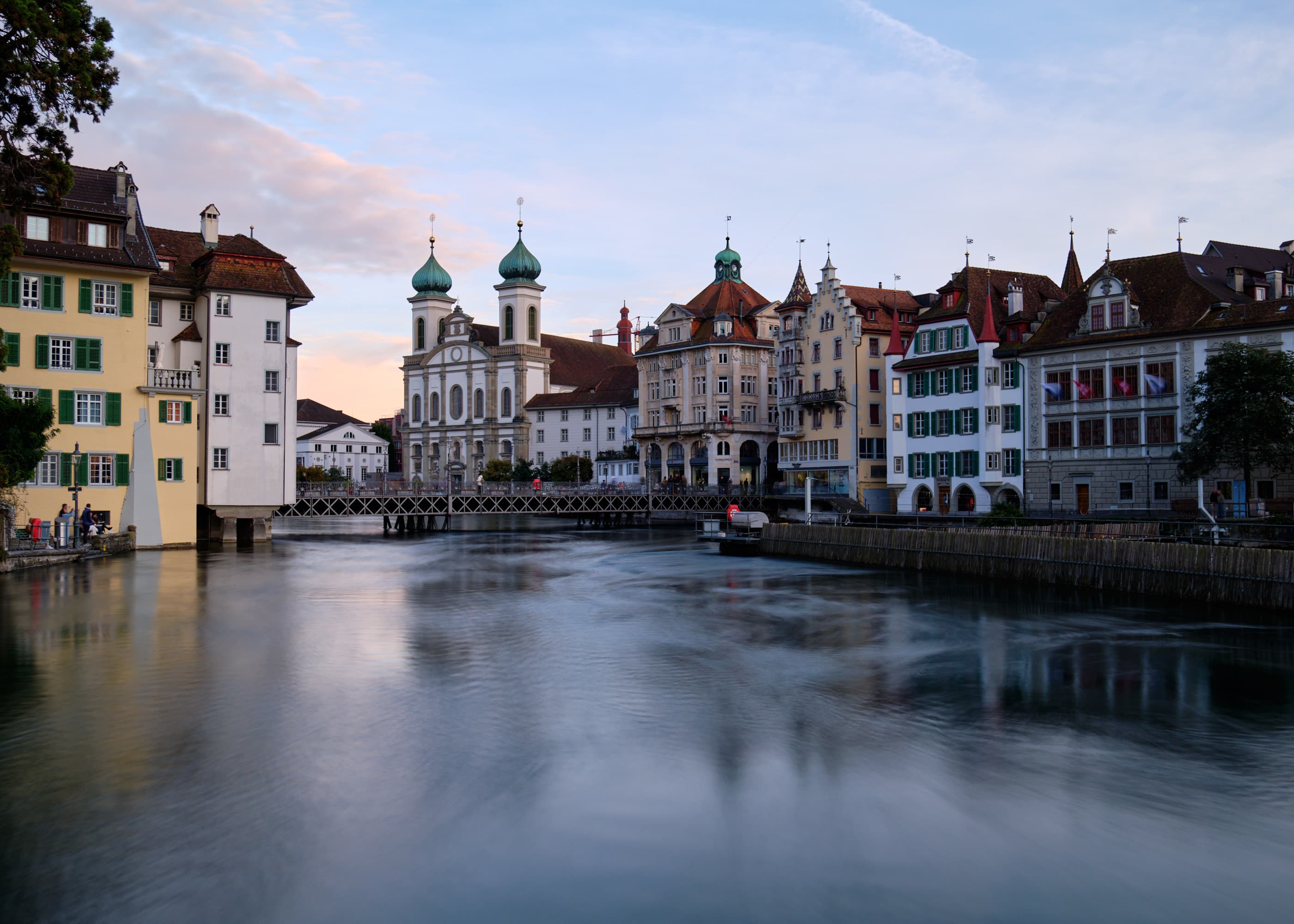 Lucerne waterfront at dusk, Jesuit Church towers reflected