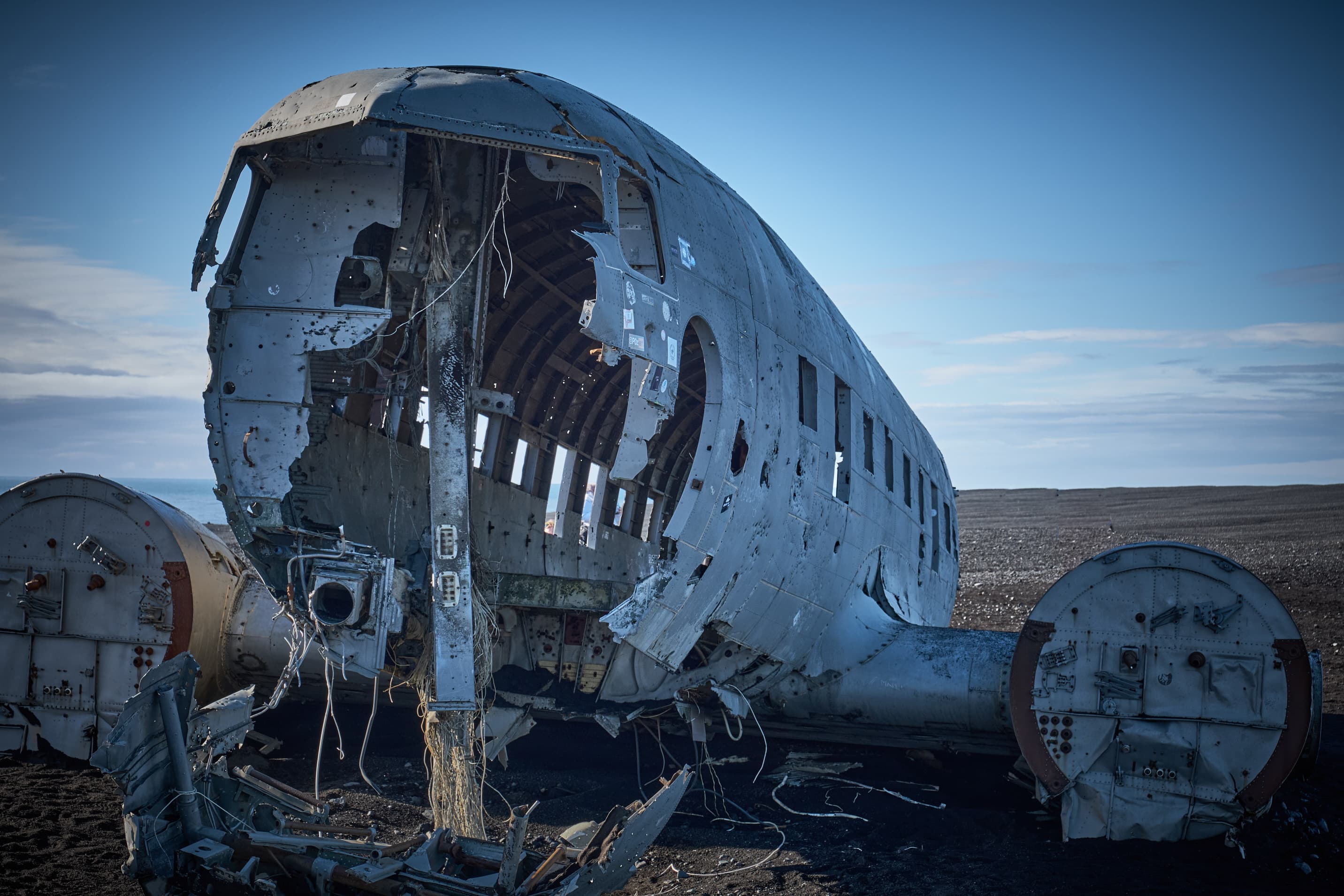 DC-3 plane wreck on black Icelandic sand beach